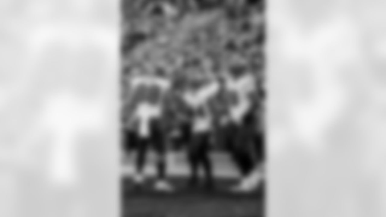 CHARLOTTE, NC - December 21, 2025 - Tight End Cade Otton #88, Running Back Sean Tucker #44, and Tackle Tristan Wirfs #78 of the Tampa Bay Buccaneers celebrate a touchdown during the game between the Tampa Bay Buccaneers and Carolina Panthers. The Bucs lost the game, 23-20. Photo By Kyle Zedaker/Tampa Bay Buccaneers