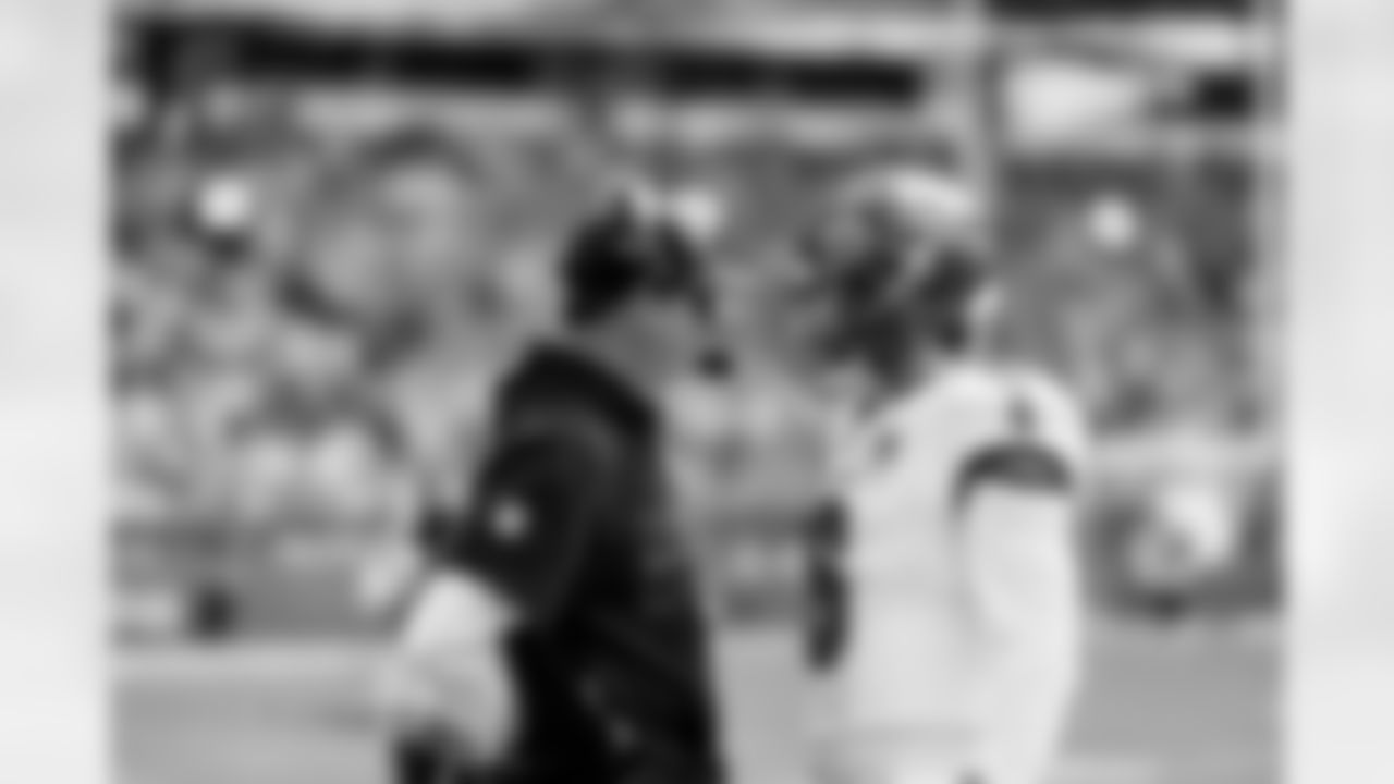 MIAMI GARDENS, FL - December 28, 2025 - Offensive Coordinator Josh Grizzard and Quarterback Baker Mayfield #6 of the Tampa Bay Buccaneers before the game between the Tampa Bay Buccaneers and Miami Dolphins. The Bucs lost the game, 20-17. Photo By Tori Richman/Tampa Bay Buccaneers