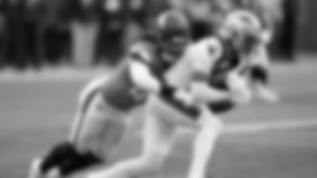 New England Patriots wide receiver Stefon Diggs is tackled by Denver Broncos linebacker Alex Singleton during the first the half of the AFC Championship NFL football game, Sunday, Jan. 25, 2026, in Denver. (AP Photo/John Locher)