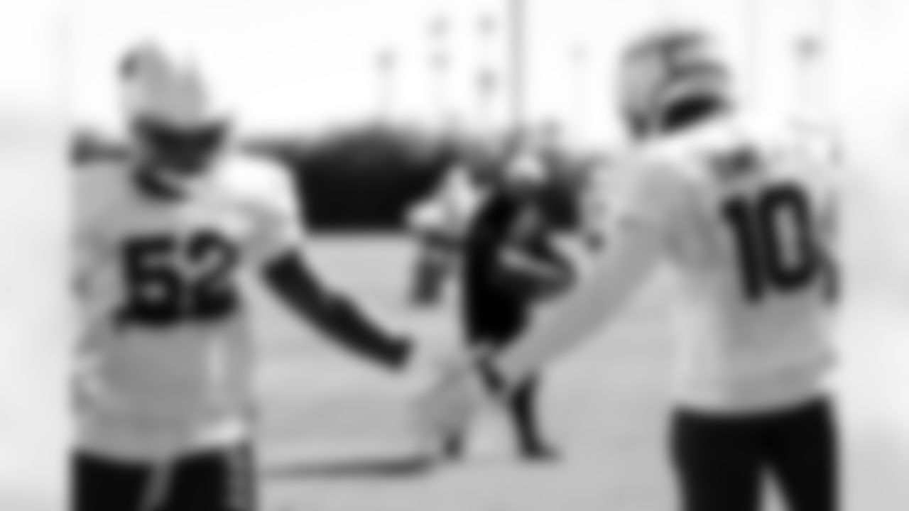 Arizona Cardinals linebacker Josh Sweat (10) and Arizona Cardinals linebacker Jordan Burch (52) during practice at the Dignity Health Training Facility on Thursday, Oct. 16, 2025 in Tempe, AZ.