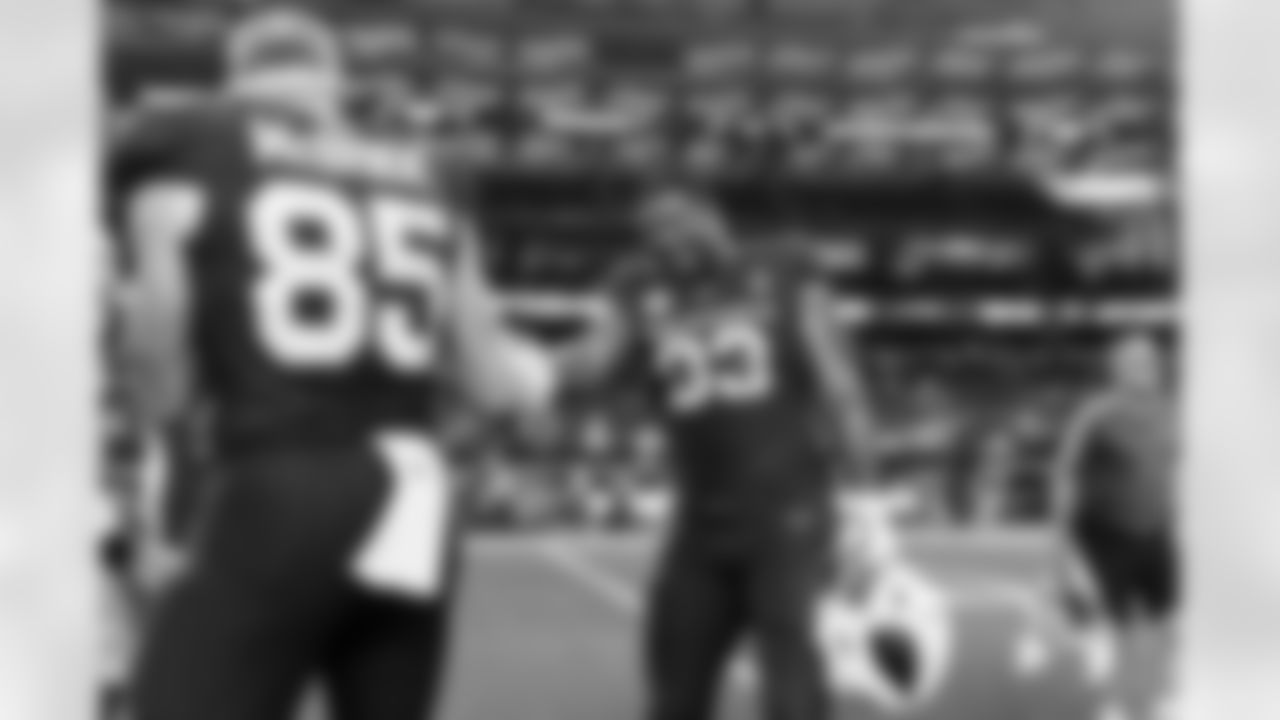 Arizona Cardinals defensive lineman Calais Campbell (93) and Arizona Cardinals tight end Trey McBride (85) during the Week 9 regular season game between the Arizona Cardinals and the Dallas Cowboys on Monday, Nov. 3, 2025 in Arlington, TX.