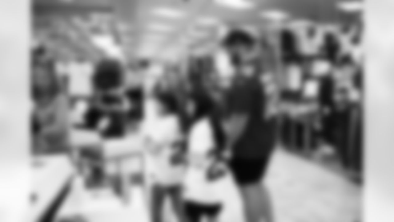 The Arizona Cardinals and Desert Financial Credit Union host a holiday shopping event at SCHEELS Chandler on Tuesday, Dec. 9, 2025 in Chandler, AZ.