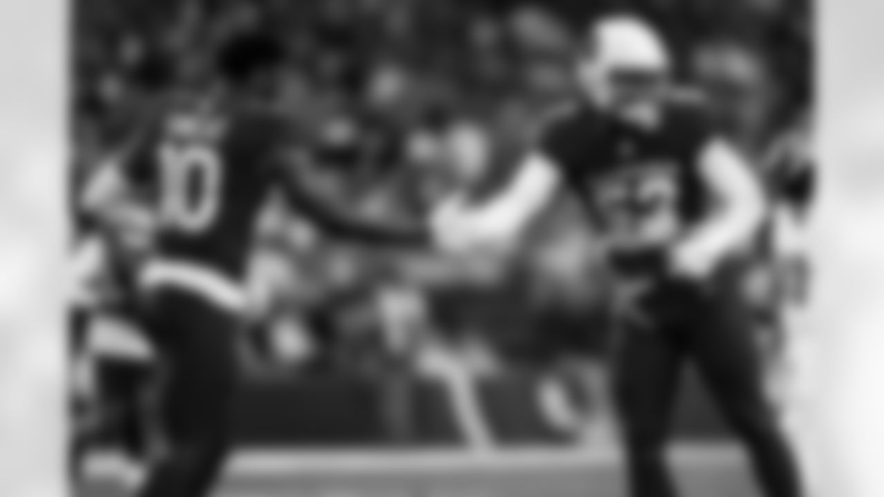 Arizona Cardinals linebacker Jordan Burch (52) and Arizona Cardinals linebacker Josh Sweat (10) during the Week 12 regular season game between the Arizona Cardinals and the Jacksonville Jaguars on Sunday, Nov. 23, 2025 at State Farm Stadium.