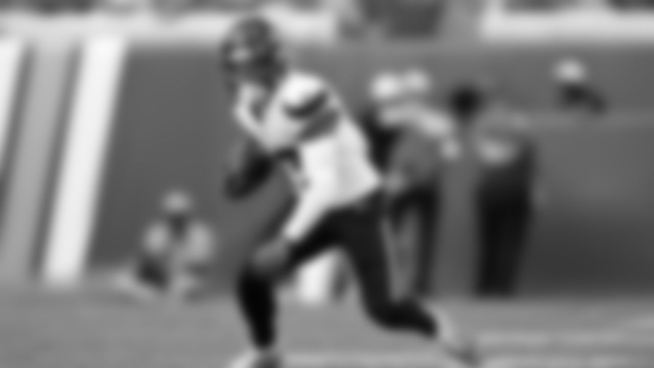 Houston Texans wide receiver Christian Kirk runs after catching a pass against the Jacksonville Jaguars during the second half of an NFL football game, Sunday, Sept. 21, 2025, in Jacksonville, Fla. (AP Photo/Phelan M. Ebenhack)