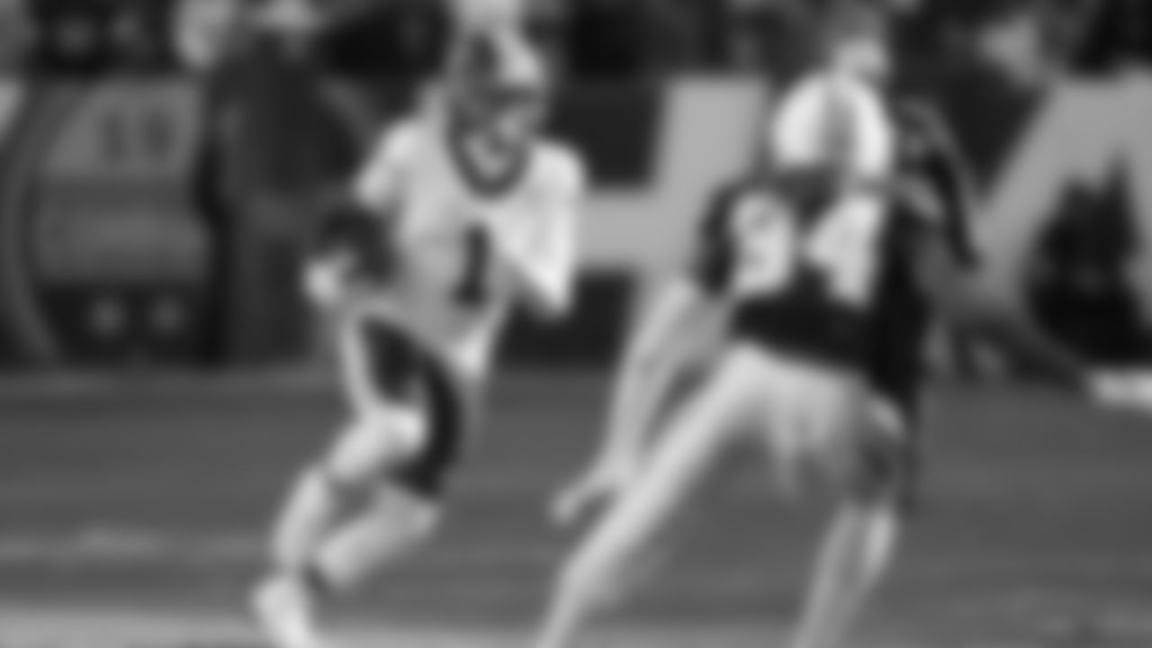 Washington Commanders wide receiver Deebo Samuel Sr. (1) runs with the ball as Dallas Cowboys cornerback Shavon Revel (34) defends during the second half an NFL football game Thursday, Dec. 25, 2025, in Landover, Md. (AP Photo/Stephanie Scarbrough)