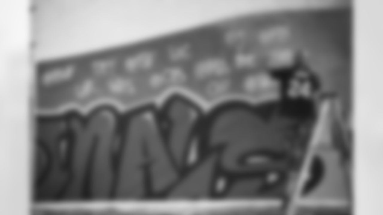 Local artists create the Arizona Cardinals Schedule Release mural on Wednesday, May 15, 2024 in Phoenix, AZ.