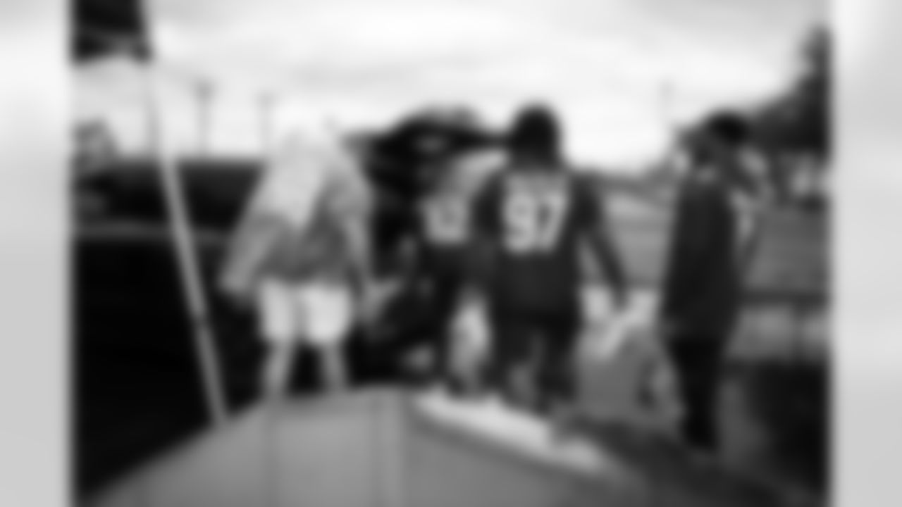 Arizona Cardinals offensive lineman Kelvin Beachum (68) and Arizona Cardinals offensive lineman Paris Johnson Jr. (70) host a food distribution for families at the Eisenhower Center for Innovation in collaboration with United Food Bank on Tuesday, Nov. 18, 2025 in Mesa, AZ.