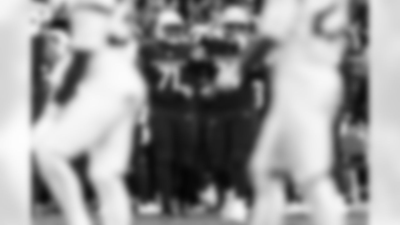 Arizona Cardinals offensive lineman Isaiah Adams (74) and Arizona Cardinals offensive lineman Jon Gaines II (71) during the Week 12 regular season game between the Arizona Cardinals and the Jacksonville Jaguars on Sunday, Nov. 23, 2025 at State Farm Stadium.