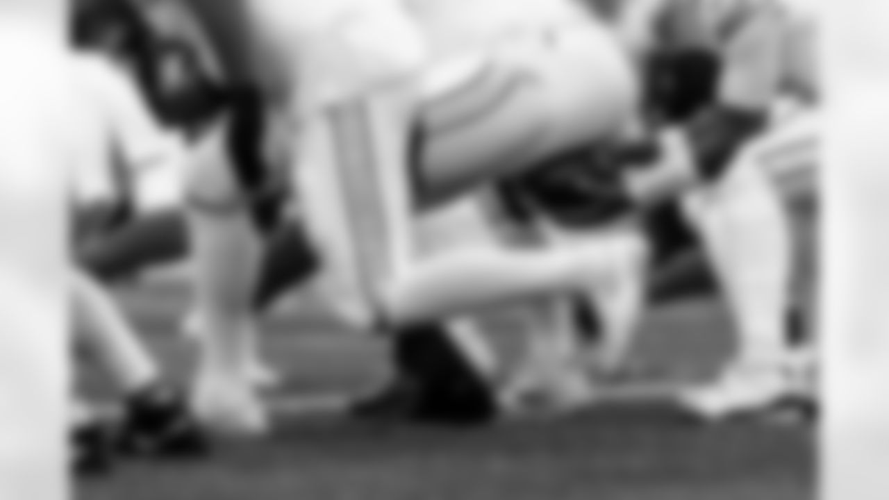 Arizona Cardinals quarterback Jacoby Brissett (7) and Arizona Cardinals offensive lineman Hjalte Froholdt (72) during the Week 17 regular season game between the Arizona Cardinals and the Cincinnati Bengals on Sunday, Dec. 28, 2025 in Cincinnati, OH.