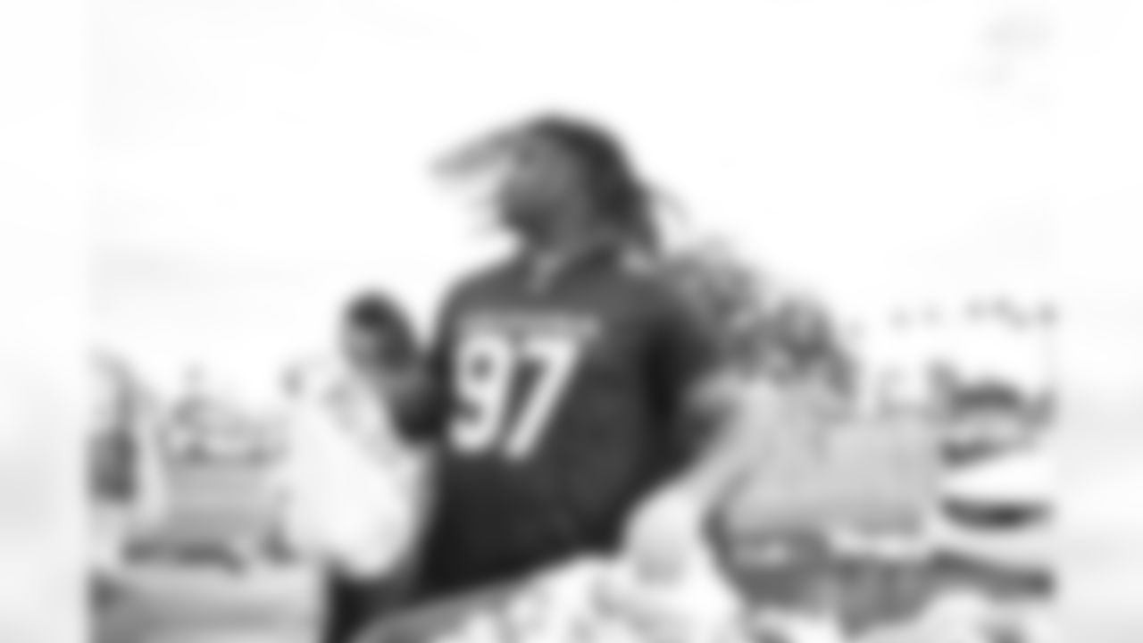 Arizona Cardinals offensive lineman Kelvin Beachum (68) and Arizona Cardinals offensive lineman Paris Johnson Jr. (70) host a food distribution for families at the Eisenhower Center for Innovation in collaboration with United Food Bank on Tuesday, Nov. 18, 2025 in Mesa, AZ.