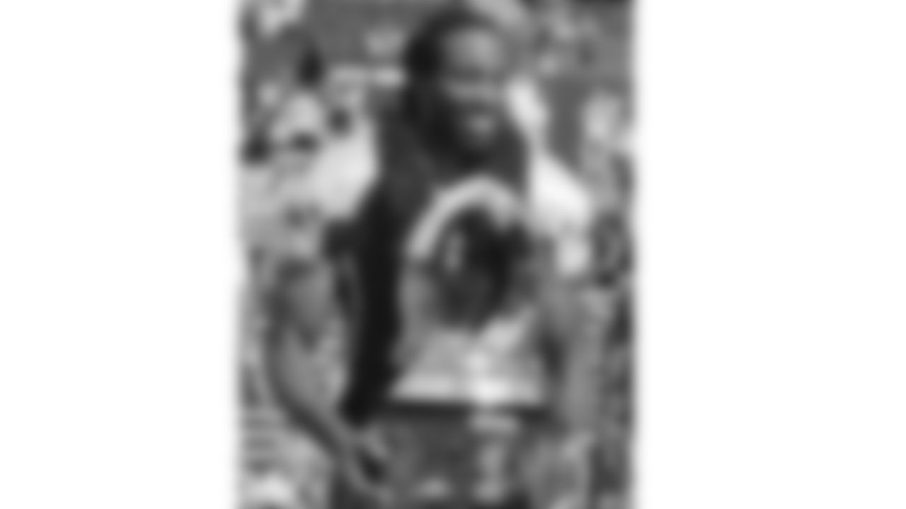 Larry Fitzgerald wins a Pro Bowl MVP trophy in 2009.