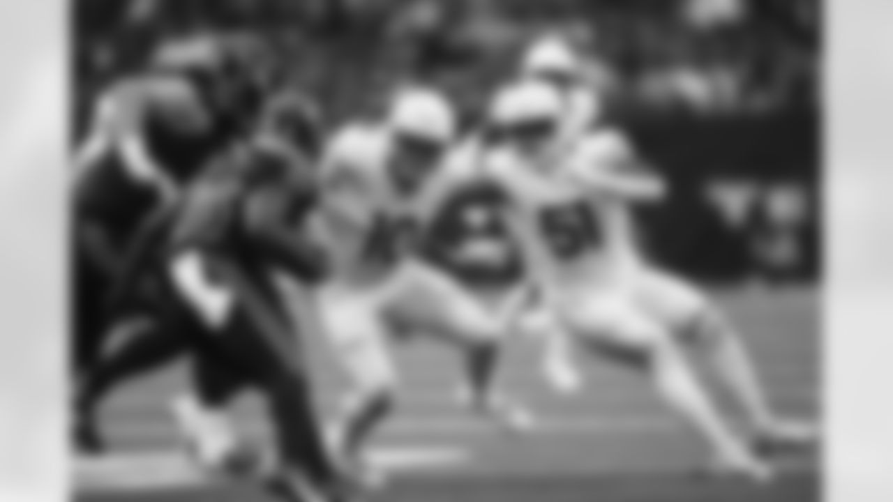 Arizona Cardinals linebacker Josh Woods (10) and Arizona Cardinals linebacker Krys Barnes (51) during the Week 11 regular season game between the Arizona Cardinals and the Houston Texans on Sunday, Nov 19, 2023 in Houston, TX.