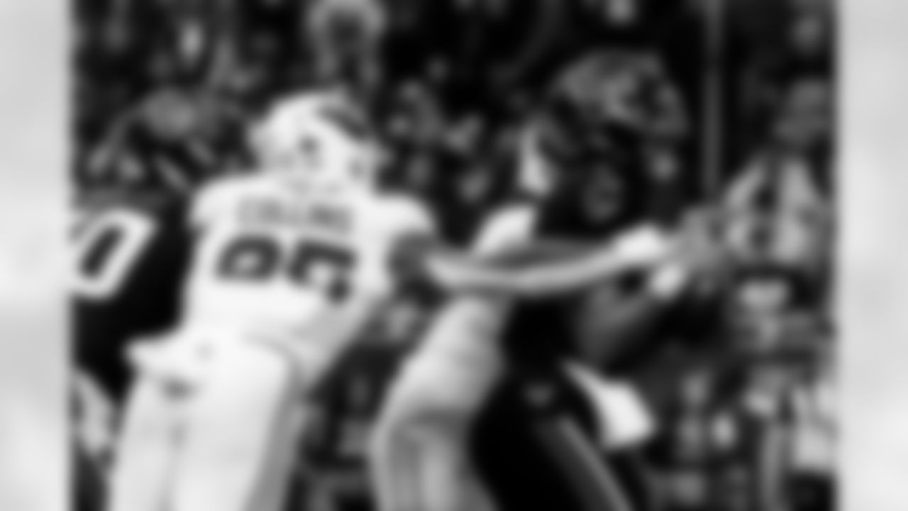 Arizona Cardinals linebacker Zaven Collins (25) and Arizona Cardinals defensive lineman Walter Nolen III (97) during the Week 15 regular season game between the Arizona Cardinals and the Houston Texans on Sunday, Dec. 14, 2025 in Houston, TX.