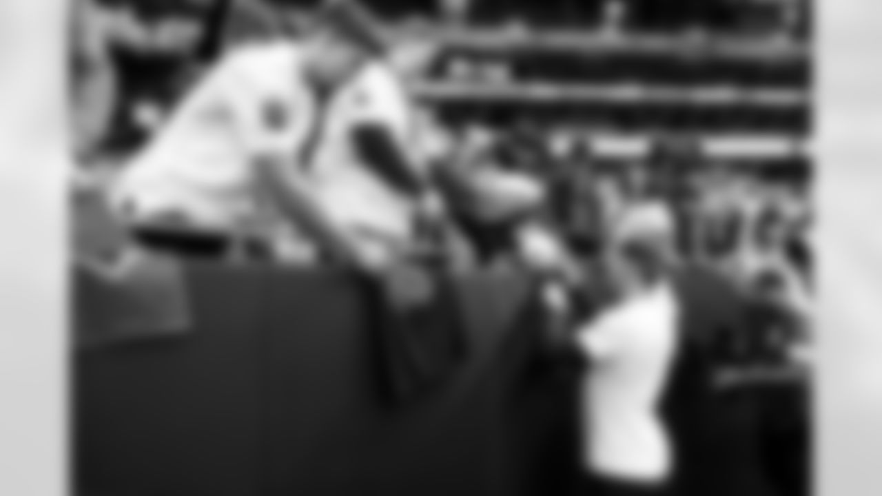 Arizona Cardinals tight end Trey McBride (85) with fans during the Week 14 regular season game between the Arizona Cardinals and the Los Angeles Rams on Sunday, Dec. 7, 2025 at State Farm Stadium.