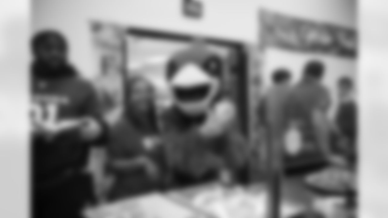 The Arizona Cardinals serve holiday meals at Phoenix Rescue Mission on Monday, Nov. 20, 2023 in Phoenix, AZ.