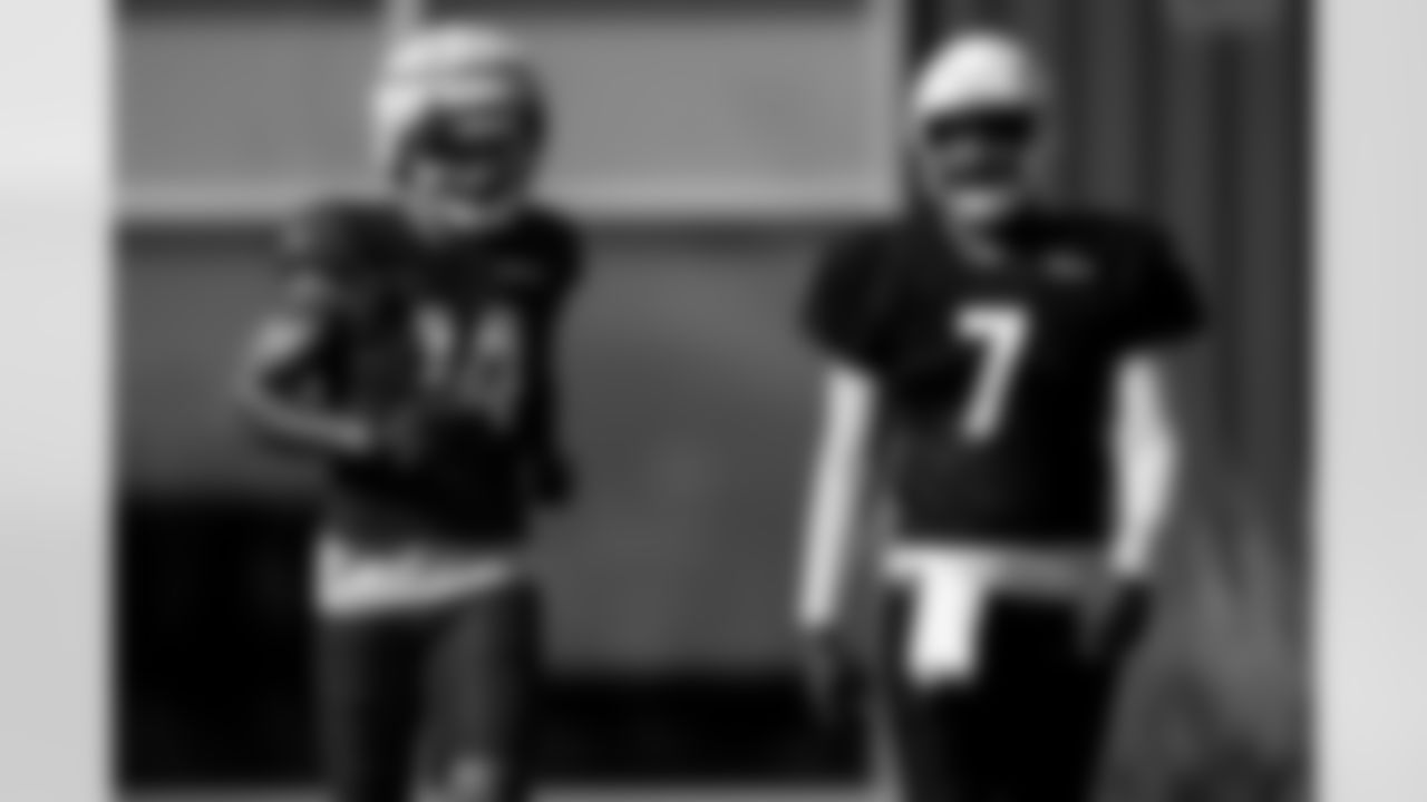 Arizona Cardinals wide receiver Michael Wilson (14) and Arizona Cardinals quarterback Jacoby Brissett (7) during practice at the Dignity Health Training Facility on Thursday, Dec. 4, 2025 in Tempe, AZ.