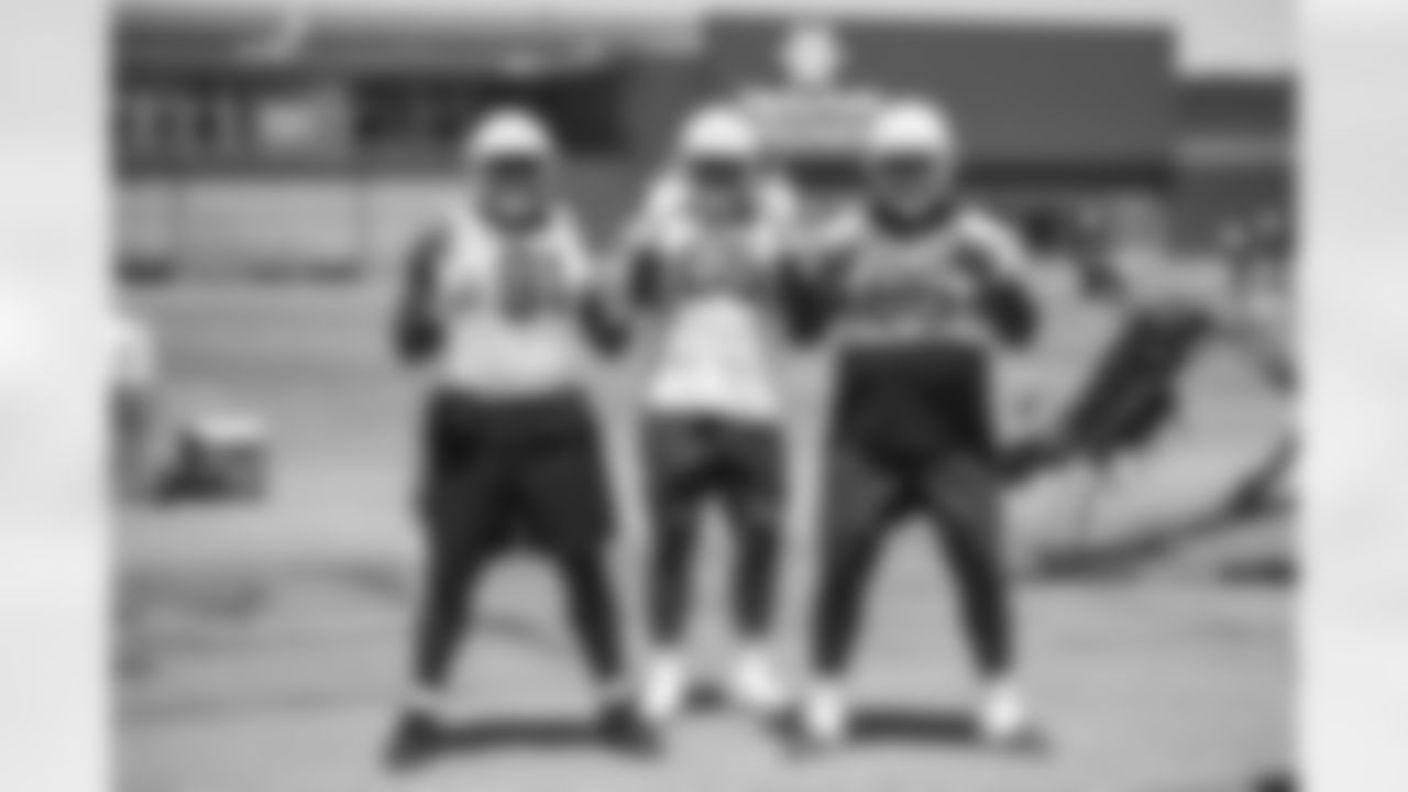 Arizona Cardinals defensive lineman L.J. Collier (91), Arizona Cardinals defensive tackle Dante Stills (55) and Arizona Cardinals defensive Naquan Jones (96) during 2024 OTA's Wednesday, May 22, 2024 in Tempe, AZ.