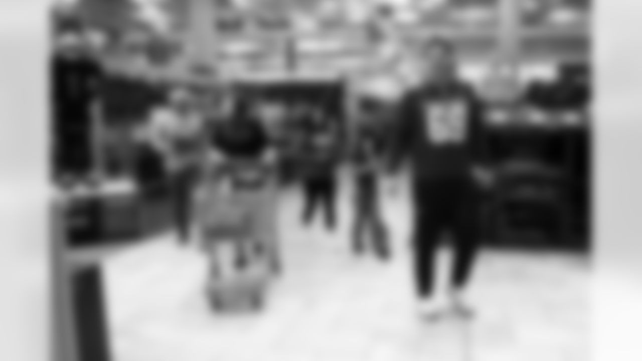 The Arizona Cardinals and Desert Financial Credit Union host a holiday shopping event at SCHEELS Chandler on Tuesday, Dec. 9, 2025 in Chandler, AZ.