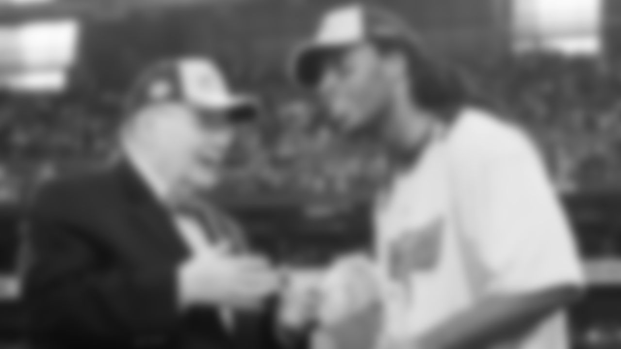 Larry Fitzgerald and owner Bill Bidwill after the Cardinals won the NFC Championship in 2008.