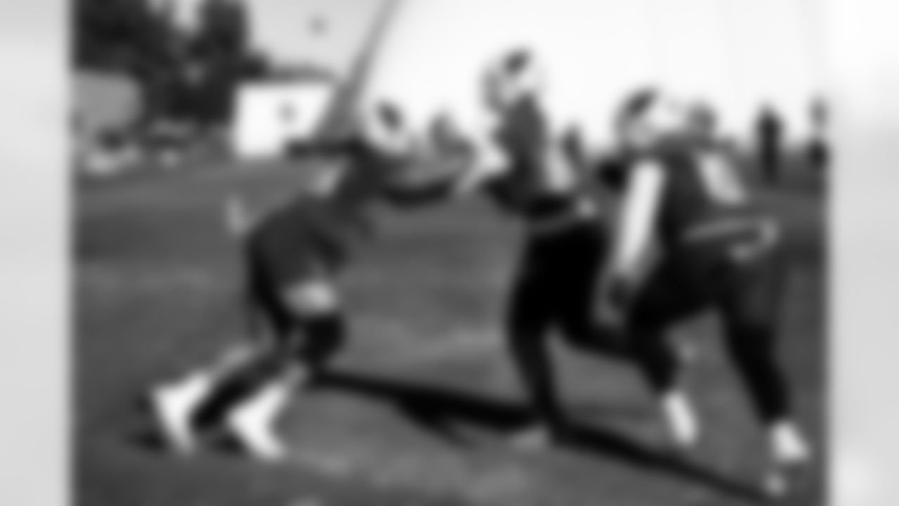 Arizona Cardinals defensive lineman Dante Stills (55) , Arizona Cardinals defensive lineman Zach Carter (90) and Arizona Cardinals defensive lineman Denzel Daxon (59) during practice at the Dignity Health Training Facility on Wednesday, Dec. 10, 2025 in Tempe, AZ.