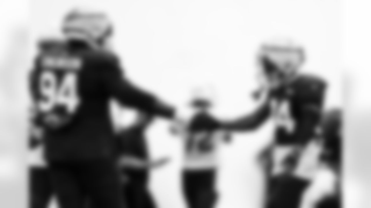 Arizona Cardinals defensive lineman Dalvin Tomlinson (94) and Arizona Cardinals safety Jalen Thompson (34) during practice at the Dignity Health Training Facility on Thursday, Oct. 9, 2025 in Tempe, AZ.