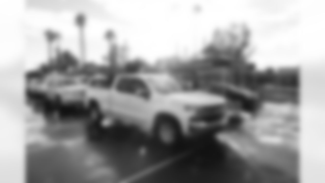 Arizona Cardinals offensive lineman Kelvin Beachum (68) and Arizona Cardinals offensive lineman Paris Johnson Jr. (70) host a food distribution for families at the Eisenhower Center for Innovation in collaboration with United Food Bank on Tuesday, Nov. 18, 2025 in Mesa, AZ.