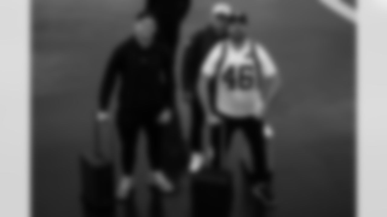 Arizona Cardinals long snapper Aaron Brewer (46) , Arizona Cardinals kicker Chad Ryland (38) and Arizona Cardinals tight end Trey McBride (85) travel to Indianapolis before the Week 6 regular season game against the Indianapolis Colts on Saturday, Oct. 11, 2025 in Phoenix, AZ.