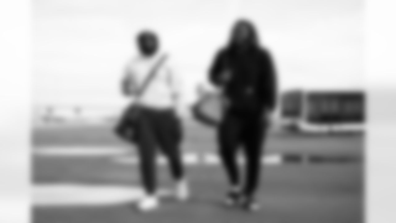 Arizona Cardinals offensive lineman Demontrey Jacobs (66) and Arizona Cardinals offensive lineman Paris Johnson Jr. (70) travels to Inglewood before the Week 18 regular season game against the Los Angeles Rams on Saturday, Jan. 3, 2026 in Phoenix, AZ.