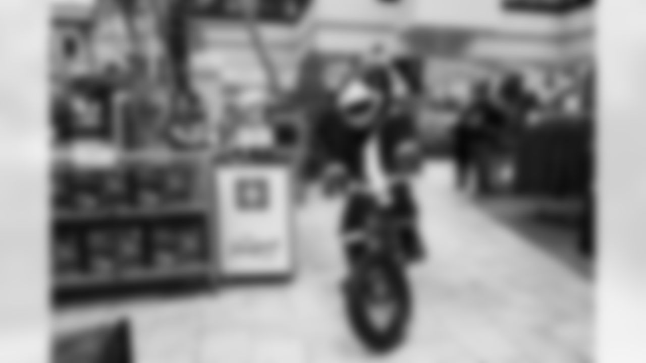 The Arizona Cardinals and Desert Financial Credit Union host a holiday shopping event at Scheel's on Tuesday, Dec. 9, 2025 in Chandler, AZ.