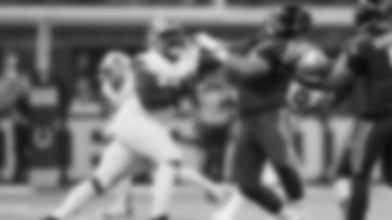 Detroit Lions defensive lineman DJ Reader (98) rushes into the backfield against Indianapolis Colts tackle Matt Goncalves (71) during an NFL football game, Sunday, Nov. 24, 2024, in Indianapolis. The Lions defeated the Colts 24-6. (AP Photo/Zach Bolinger)