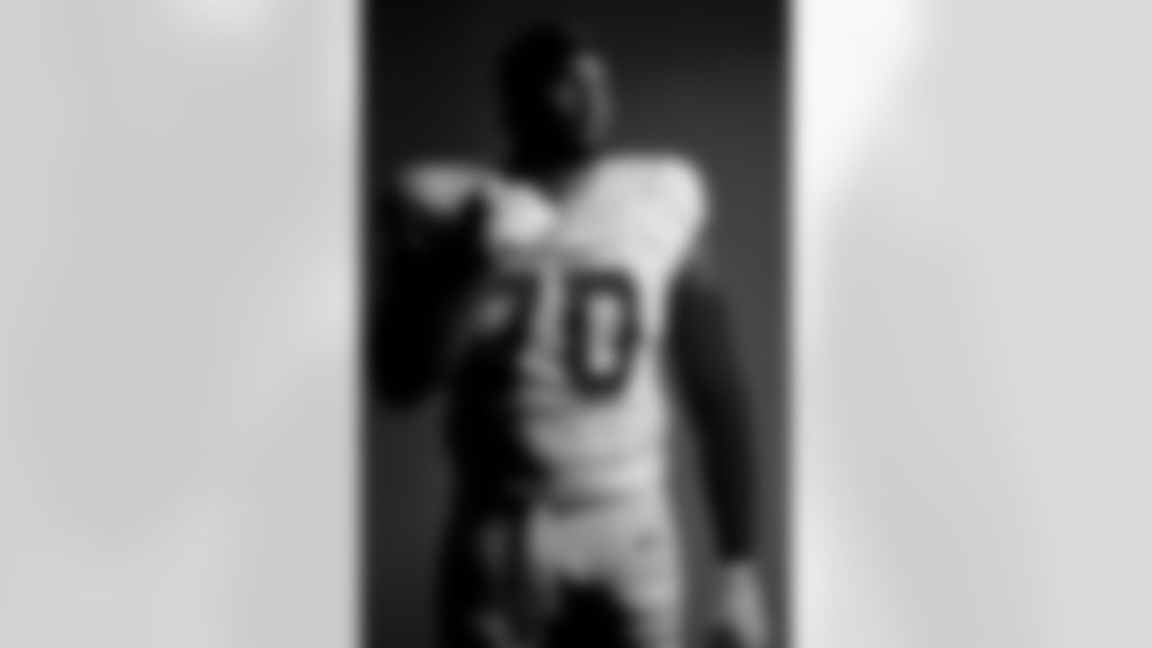 Arizona Cardinals offensive lineman Paris Johnson Jr. (70) wearing the NFL/Nike Rivalry Series uniform.