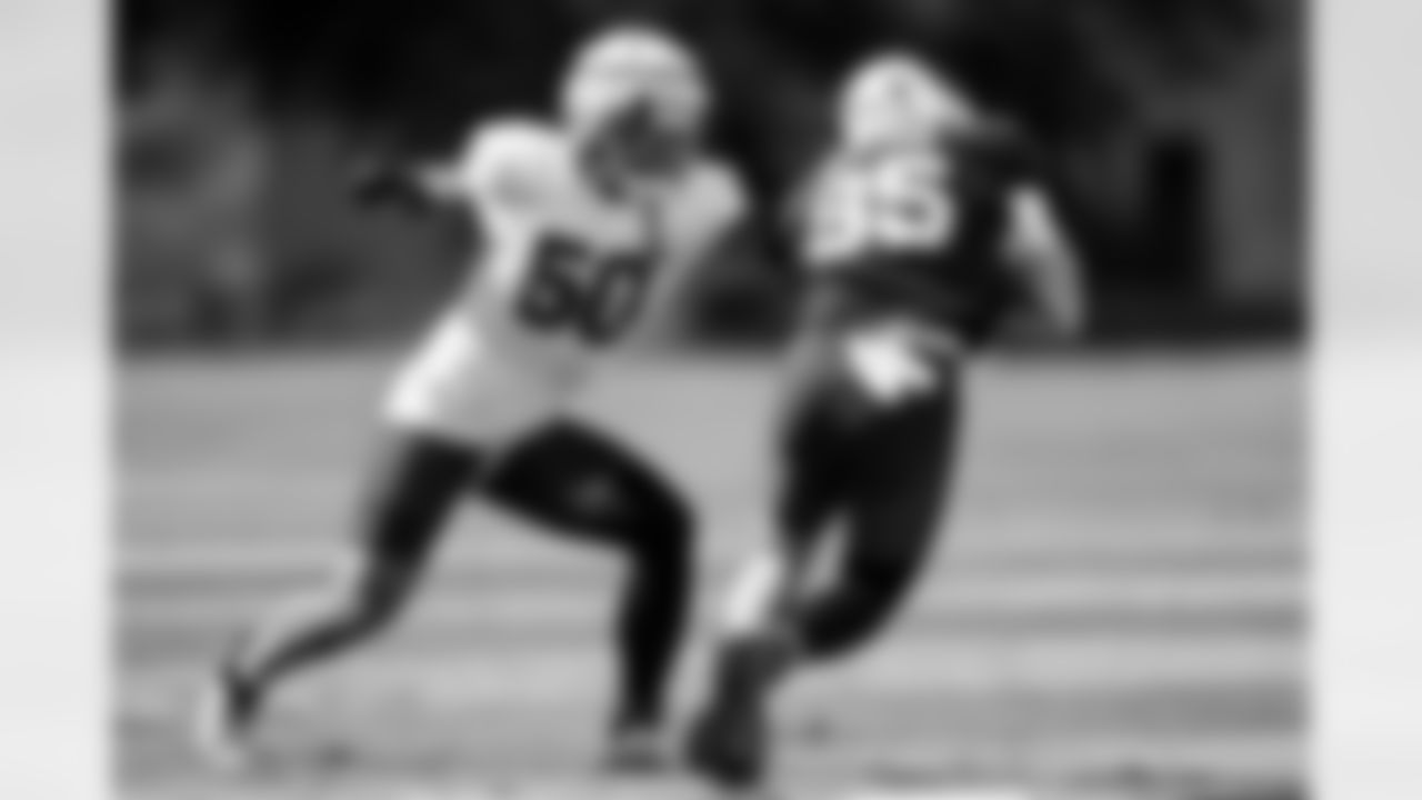 Arizona Cardinals linebacker Cody Simon (50) and Arizona Cardinals tight end Trey McBride (85) during practice at the Dignity Health Training Facility on Thursday, Oct. 16, 2025 in Tempe, AZ.