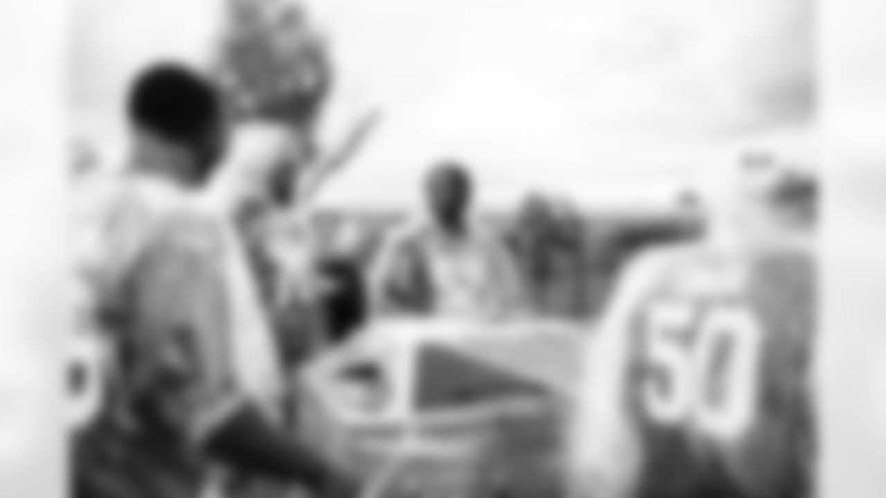 Arizona Cardinals offensive lineman Kelvin Beachum (68) and Arizona Cardinals offensive lineman Paris Johnson Jr. (70) host a food distribution for families at the Eisenhower Center for Innovation in collaboration with United Food Bank on Tuesday, Nov. 18, 2025 in Mesa, AZ.