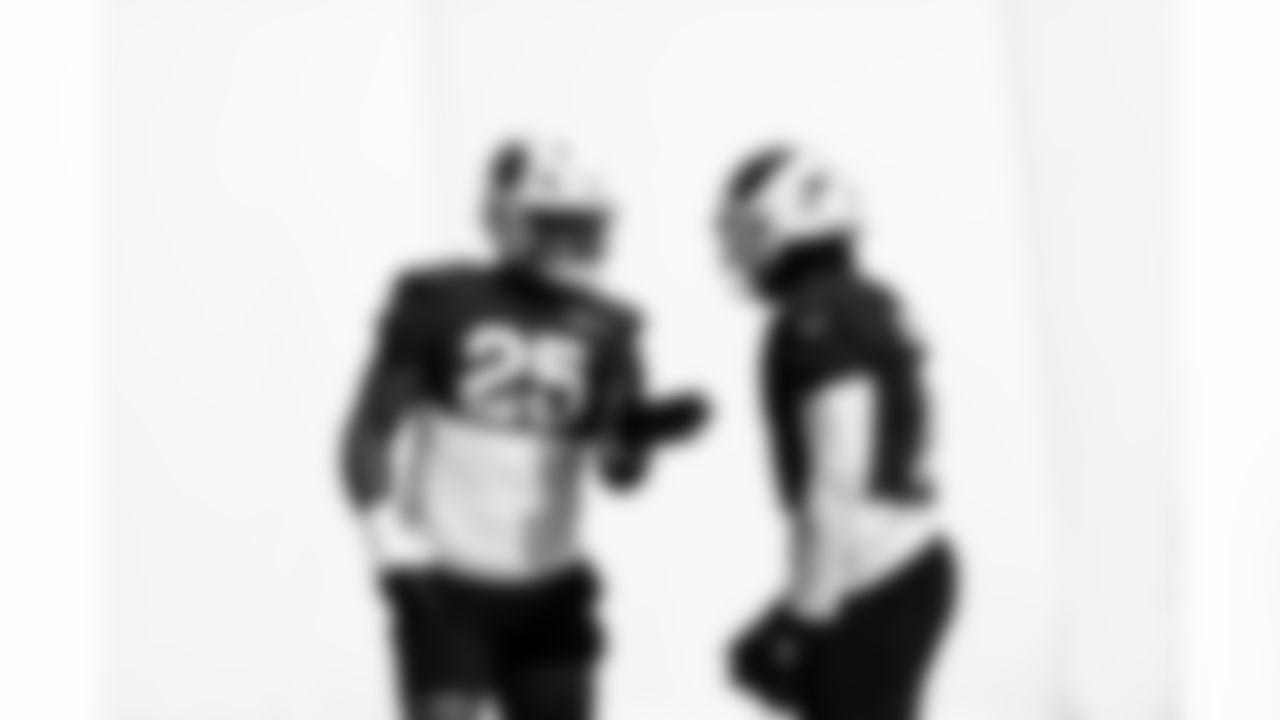 Arizona Cardinals linebacker Zaven Collins (25) and Arizona Cardinals linebacker BJ Ojulari (9) during practice at the Dignity Health Training Facility on Wednesday, Nov. 26, 2025 in Tempe, AZ.