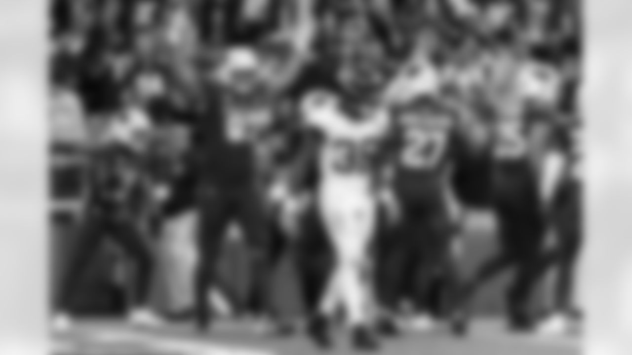 Arizona Cardinals defensive lineman Calais Campbell (93) and Arizona Cardinals safety Budda Baker (3) during the Week 12 regular season game between the Arizona Cardinals and the Jacksonville Jaguars on Sunday, Nov. 23, 2025 at State Farm Stadium.