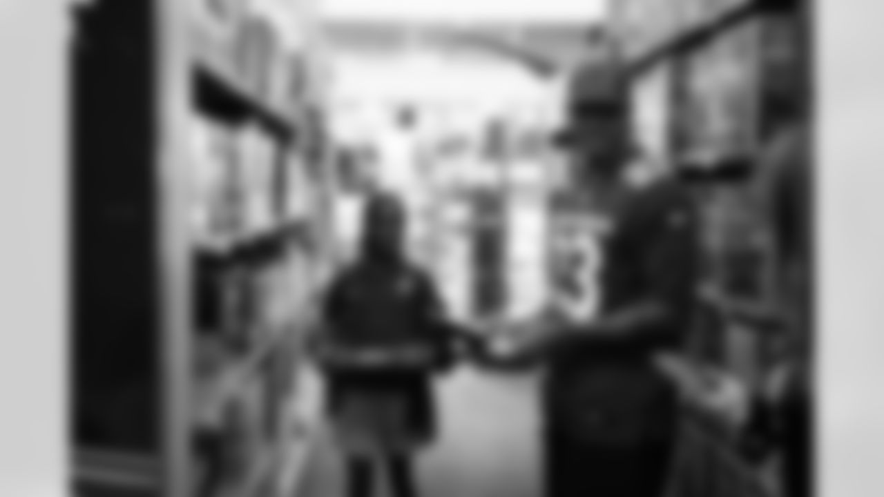 The Arizona Cardinals and Desert Financial Credit Union host a holiday shopping event at SCHEELS Chandler on Tuesday, Dec. 9, 2025 in Chandler, AZ.