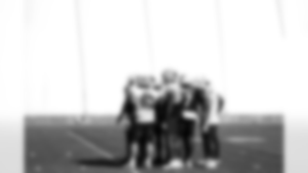 Arizona Cardinals offensive lineman Evan Brown (63), Arizona Cardinals offensive lineman Paris Johnson Jr. (70) and Arizona Cardinals quarterback Jacoby Brissett (7) during practice at the Dignity Health Training Facility on Thursday, Nov. 6, 2025 in Tempe, AZ.