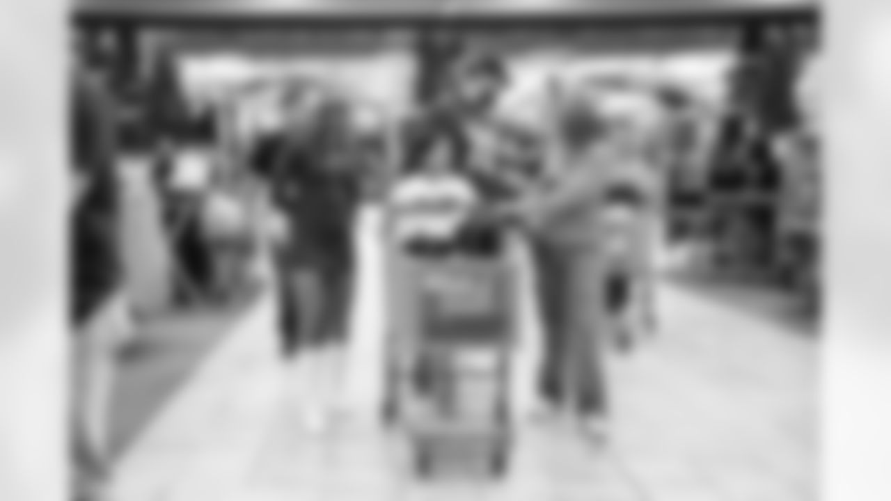 The Arizona Cardinals and Desert Financial Credit Union host a holiday shopping event at SCHEELS Chandler on Tuesday, Dec. 9, 2025 in Chandler, AZ.