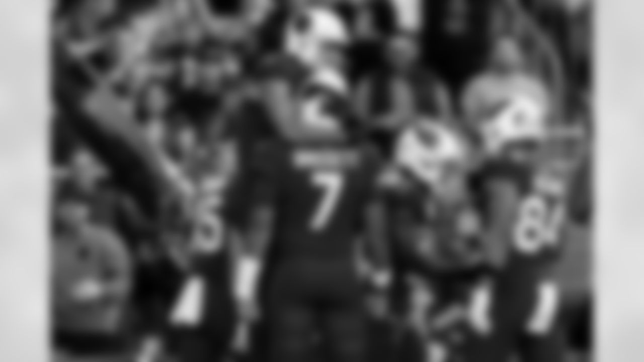 Arizona Cardinals wide receiver Michael Wilson (14) and Arizona Cardinals quarterback Jacoby Brissett (7) during the Week 14 regular season game between the Arizona Cardinals and the Los Angeles Rams on Sunday, Dec. 7, 2025 at State Farm Stadium.