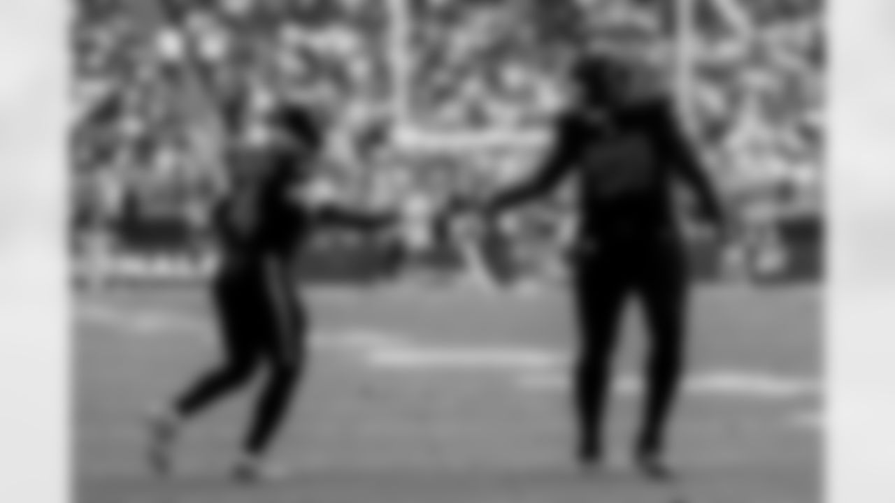 Arizona Cardinals offensive lineman Kelvin Beachum (68) and Arizona Cardinals wide receiver Greg Dortch (4) during the Week 11 regular season game between the Arizona Cardinals and the San Francisco 49ers on Sunday, Nov. 16, 2025 at State Farm Stadium.