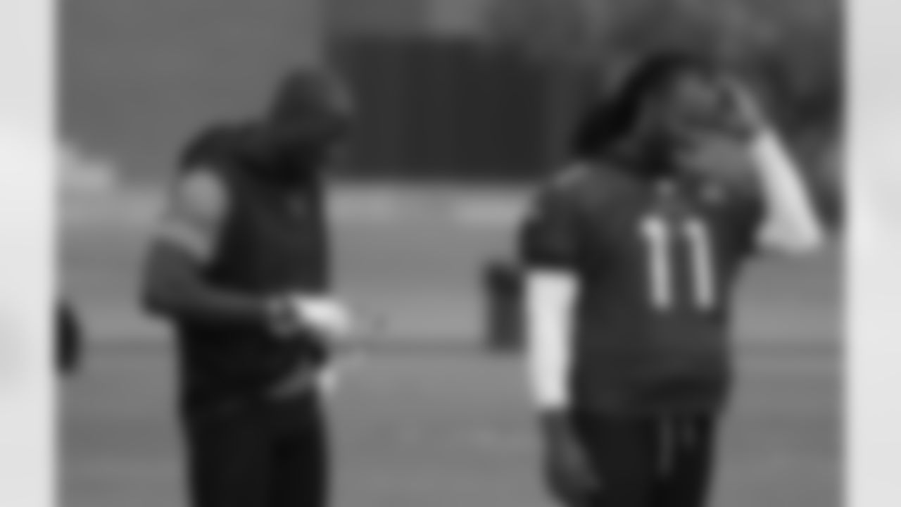 Larry Fitzgerald and Terrell Owens during an OTA in 2019.