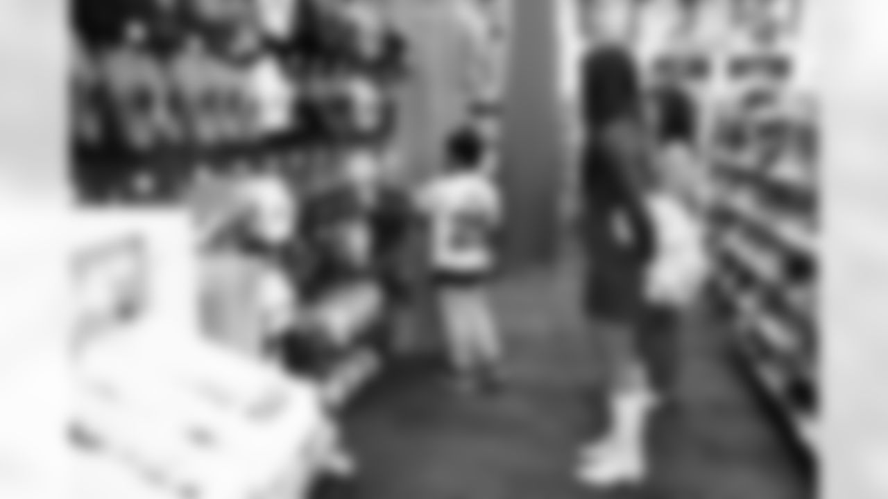 The Arizona Cardinals and Desert Financial Credit Union host a holiday shopping event at Scheel's on Tuesday, Dec. 9, 2025 in Chandler, AZ.