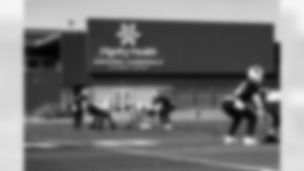 Arizona Cardinals quarterback Kedon Slovis (19) , Arizona Cardinals offensive lineman Jon Gaines II (71) , Arizona Cardinals offensive lineman Hjalte Froholdt (72) and Arizona Cardinals quarterback Jacoby Brissett (7) during practice at the Dignity Health Training Facility on Thursday, Dec. 18, 2025 in Tempe, AZ.