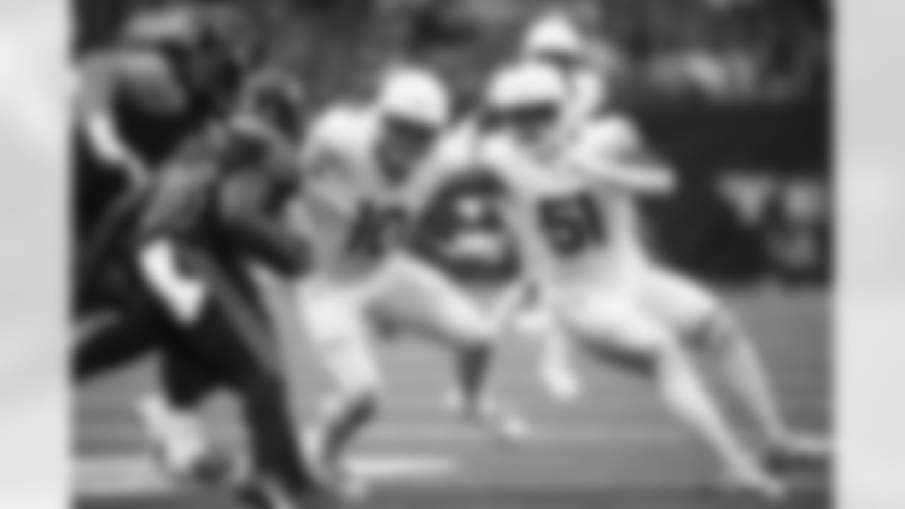 Arizona Cardinals linebacker Josh Woods (10) and Arizona Cardinals linebacker Krys Barnes (51) during the Week 11 regular season game between the Arizona Cardinals and the Houston Texans on Sunday, Nov 19, 2023 in Houston, TX.