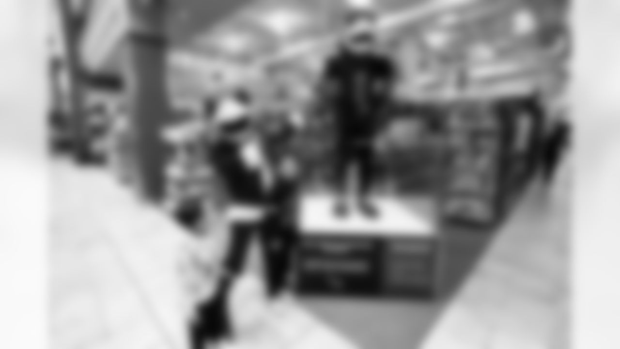 The Arizona Cardinals and Desert Financial Credit Union host a holiday shopping event at Scheel's on Tuesday, Dec. 9, 2025 in Chandler, AZ.