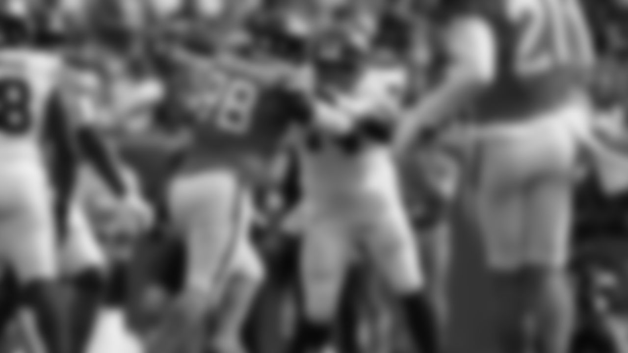 Denver Broncos defensive end John Franklin-Myers (98) pushes New York Giants guard Greg van Roten during the first half of an NFL football game in Denver, Sunday, Oct. 19, 2025. (AP Photo/Jack Dempsey)