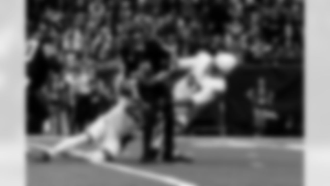 Arizona Cardinals linebacker Zaven Collins (25) and Arizona Cardinals defensive lineman Walter Nolen III (97) during the Week 15 regular season game between the Arizona Cardinals and the Houston Texans on Sunday, Dec. 14, 2025 in Houston, TX.