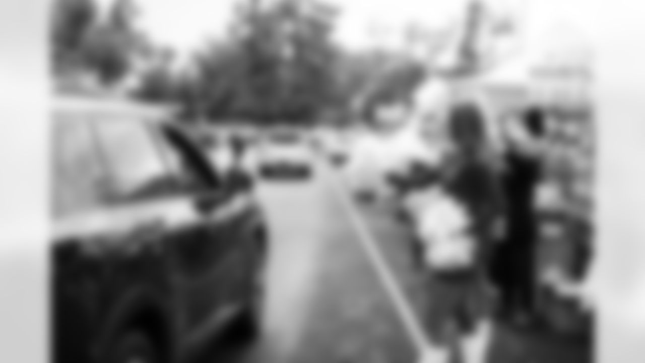 State Farm, Desert Financial Credit Union, and the Arizona Cardinals teamed up with United Food Bank to donate meals to local families in need at Mesa Convention Center on Wednesday, Nov. 19, 2025 in Mesa, AZ.