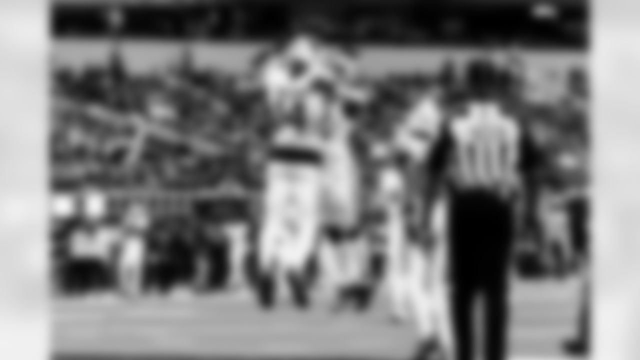 Arizona Cardinals wide receiver Michael Wilson (14) and Arizona Cardinals running back Michael Carter (22) during the Week 18 regular season game between the Arizona Cardinals and the Los Angeles Rams on Sunday, Jan. 4, 2026 in Los Angeles, CA.