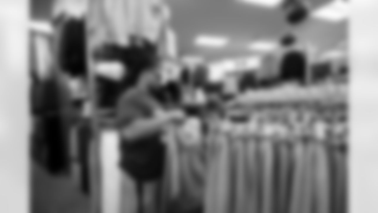 The Arizona Cardinals and Desert Financial Credit Union host a holiday shopping event at Scheel's on Tuesday, Dec. 9, 2025 in Chandler, AZ.